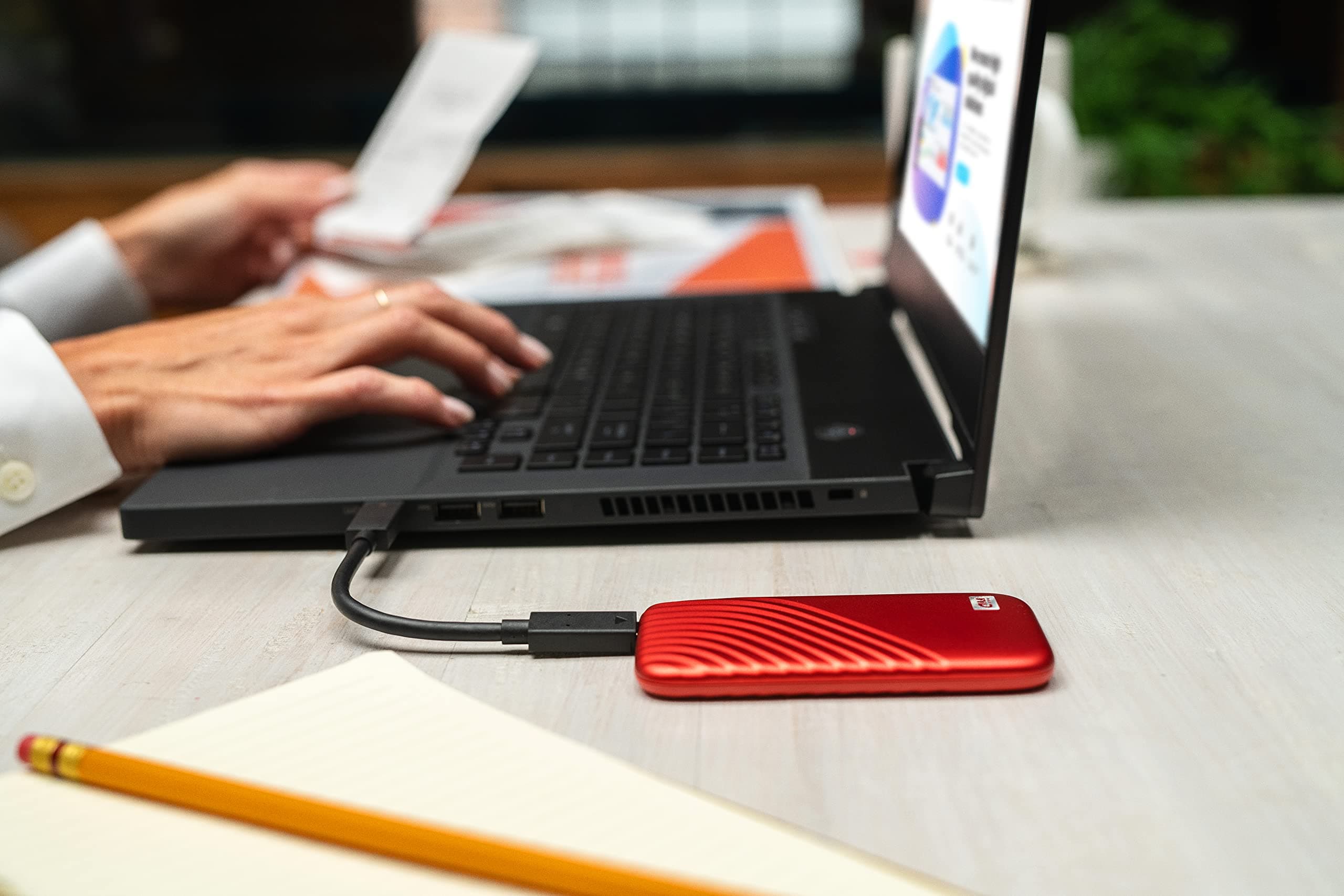 Western Digital 2TB My Passport SSD Portable External Solid State Drive, Red, Sturdy and Blazing Fast, Password Protection with Hardware Encryption - WDBAGF0020BRD-WESN - Image 2